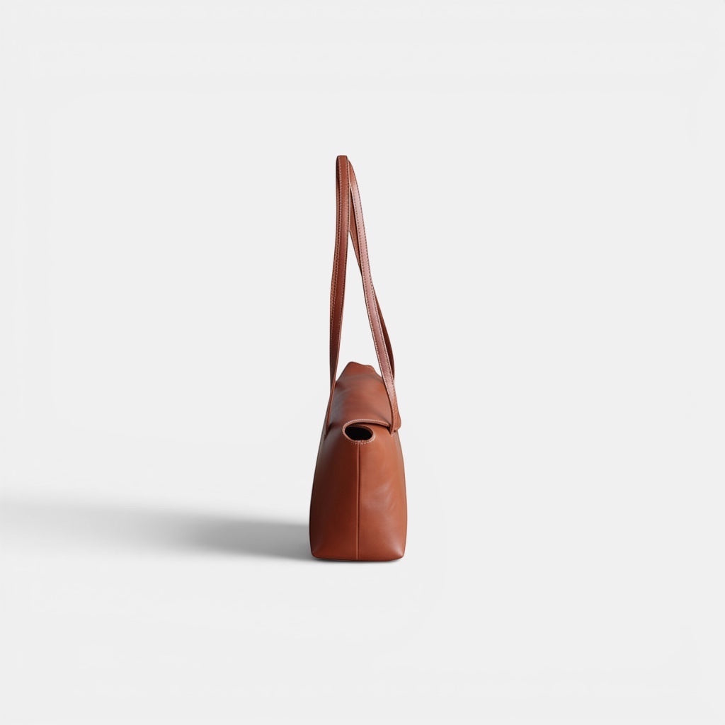 SELENE AMAS Juliet Bag in chestnut brown premium leather with a minimalist design and thin shoulder strap.