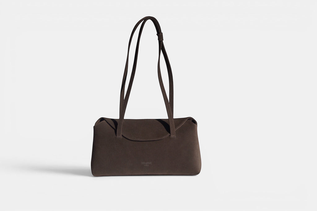 SELENE AMAS Juliette Espresso Suede handbag made from premium suede leather with a flap closure and thin shoulder straps.